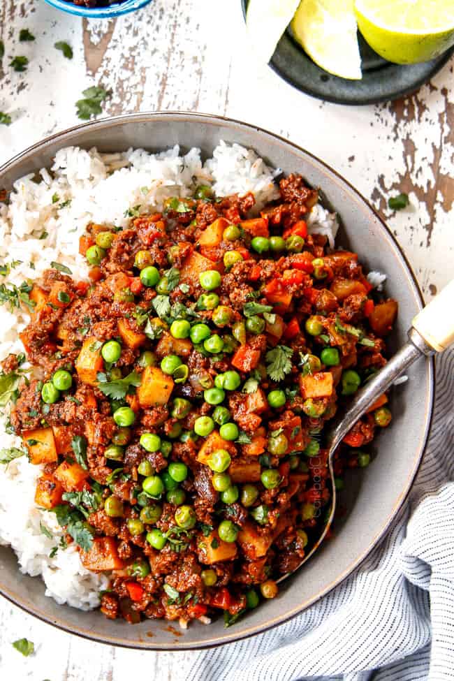 top view showing how to serve Picadillo recipe by serving over rice in a large bowl