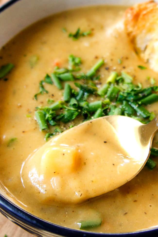 up close of a spoonful of Leek and Soup recipe showing how creamy it is