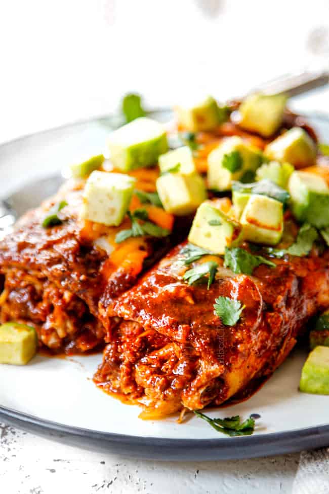 up close of chicken enchilada recipe showing how saucy it is