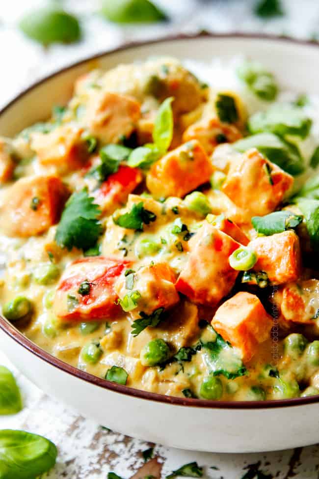 a bowl of green curry chicken recipe with vegetables