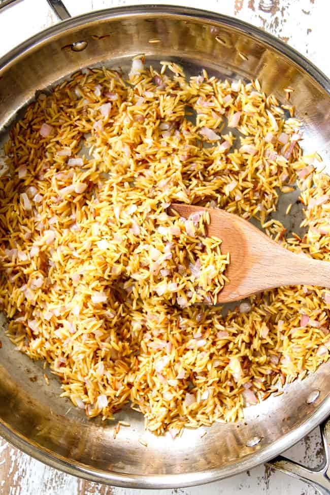 showing how to make Lemon Garlic Shrimp by sauteing orzo until toasted