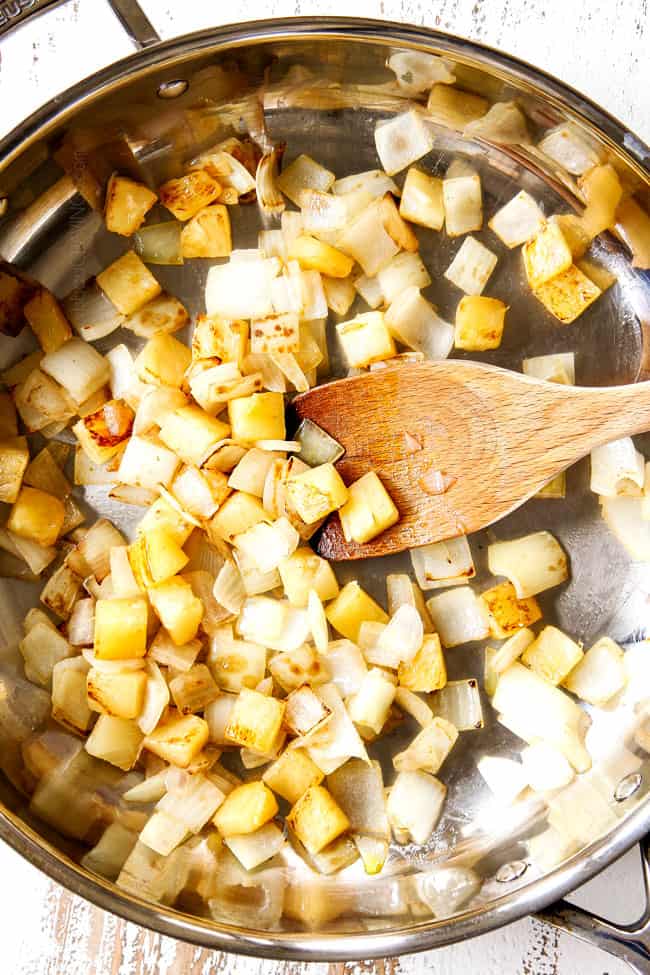 showing how to make sweet and sour chicken by stir frying pineapple and onions