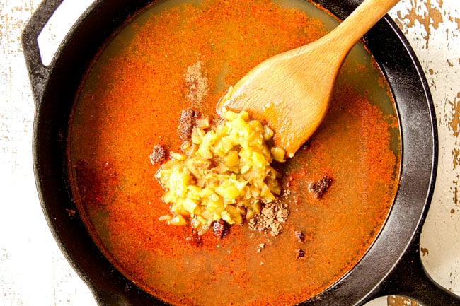 showing how to make chicken tostadas by adding chicken broth, green chilies and tomato paste to a skillet to braise chicken