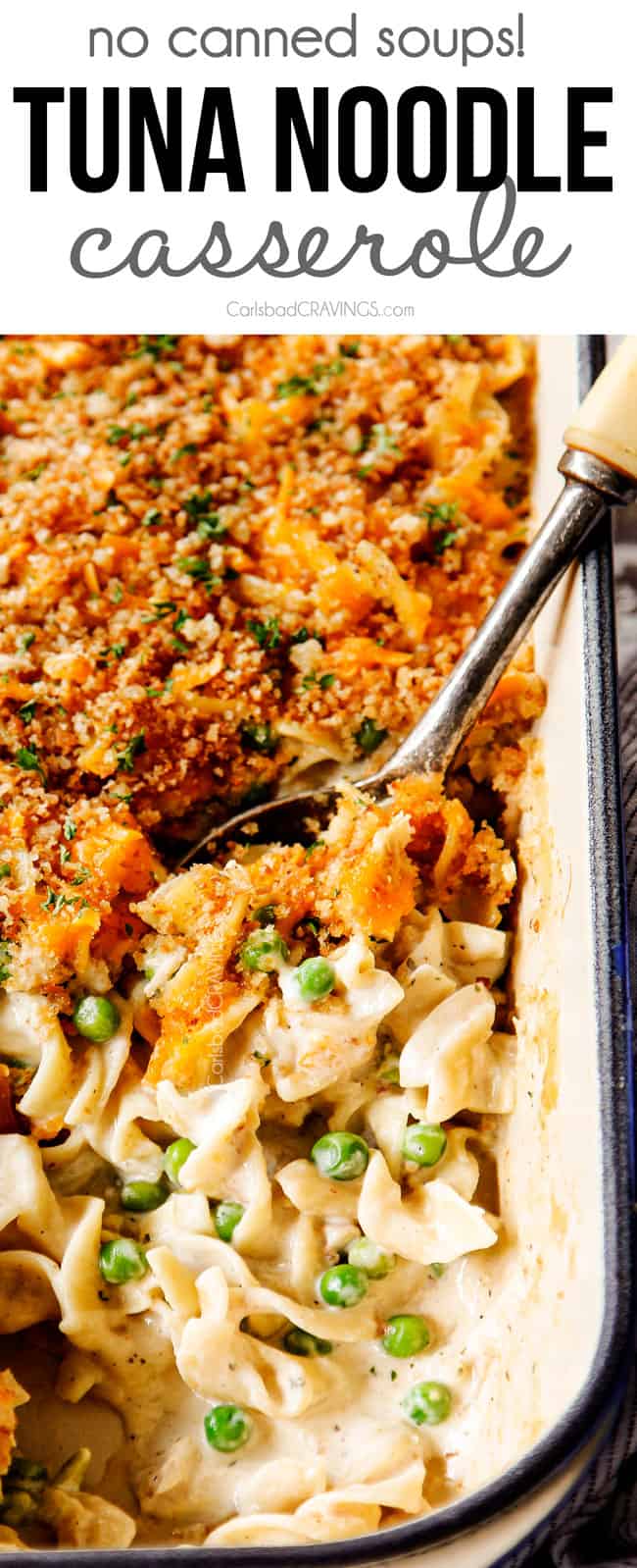 up close of a spoon scooping tuna noodle casserole to show how creamy it is