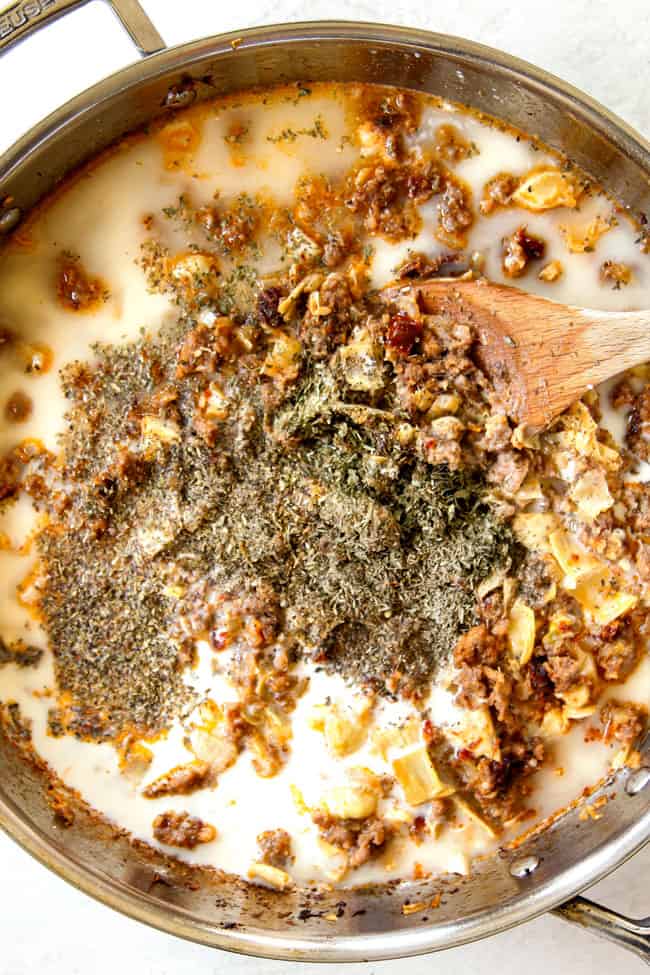 showing how to cook linguine by adding chicken broth, half and half and spices to skillet