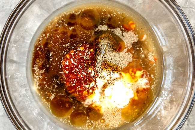 showing how to make Chicken and Broccoli recipe by whisking sauce together of chicken broth, oyster sauce, brown sugar, cornstarch