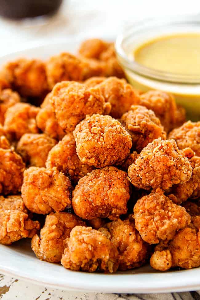 showing how to serve KFC Popcorn Chicken by serving with Honey Mustard Dip