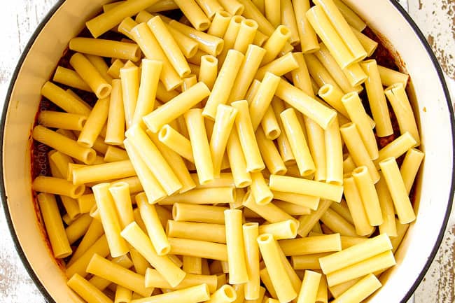 showing how to make best Baked Ziti recipe by cooking ziti pasta