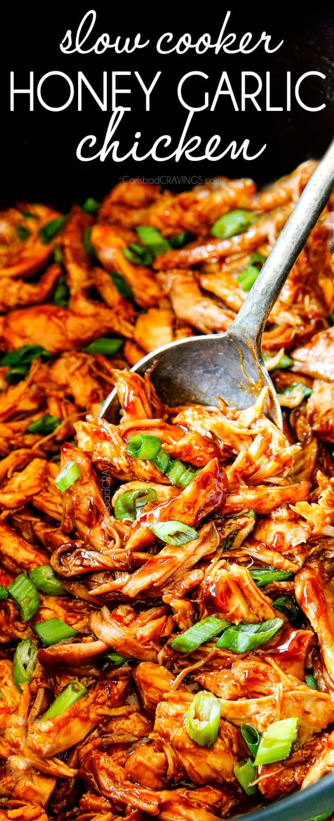 up close of a spoon serving honey garlic chicken recipe in a crockpot