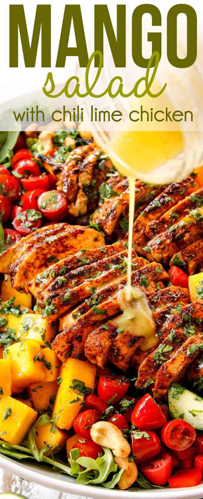 showing how to make mango salad by pouring honey lime vinaigrette over chicken