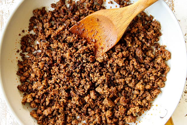 showing how to make breakfast quesadillas by browning sausage in a skillet