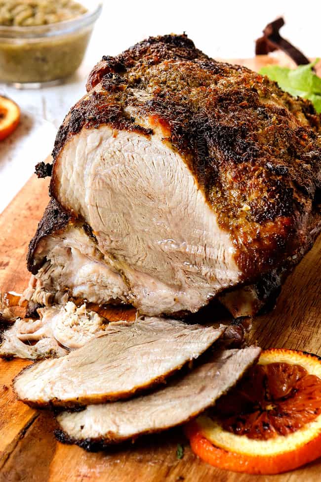 showing how to make mojo Cuban roast pork for Cuban sandwich recipe (Cubanos)