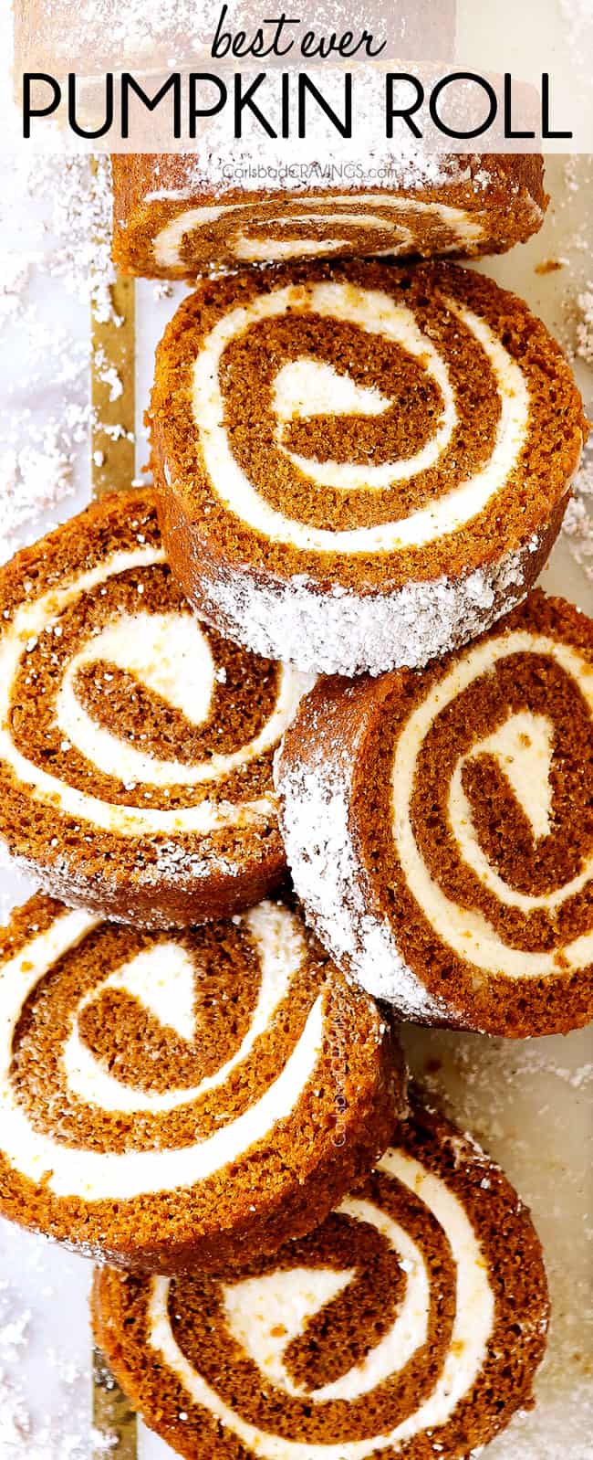 top view of pumpkin roll recipe sliced on a white cutting board