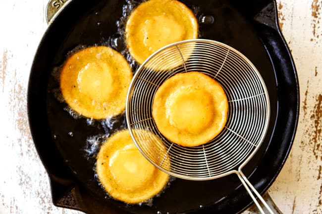 showing how to make sopes by frying sopes in oil