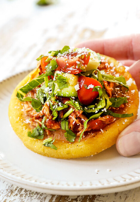 a hand picking up a sope