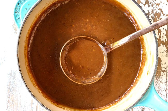 showing how to make slow cooker beef and broccoli recipe by thickening the sauce in a saucepan