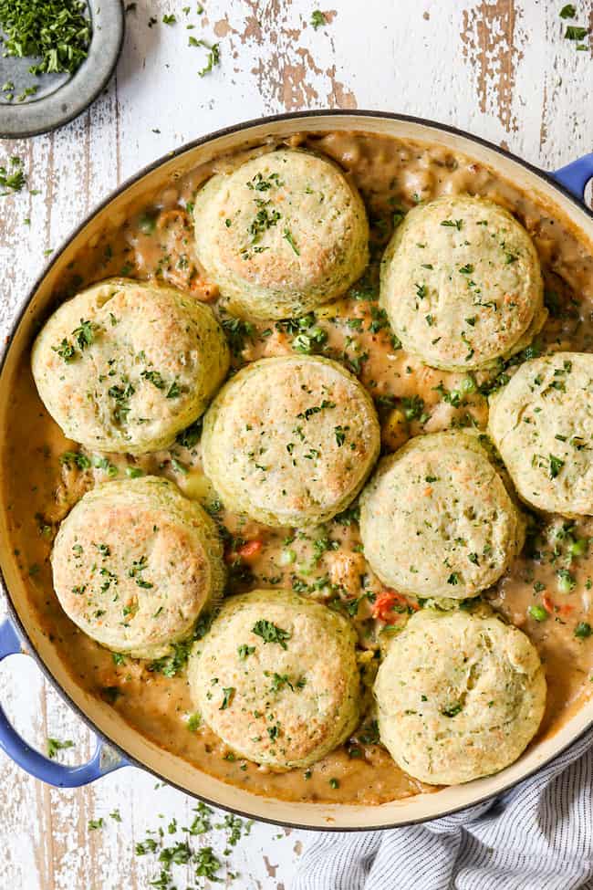 top view of homemade chicken pot pie with biscuits in a skillet