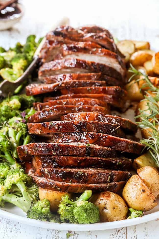 up close of pork loin sliced on a platter