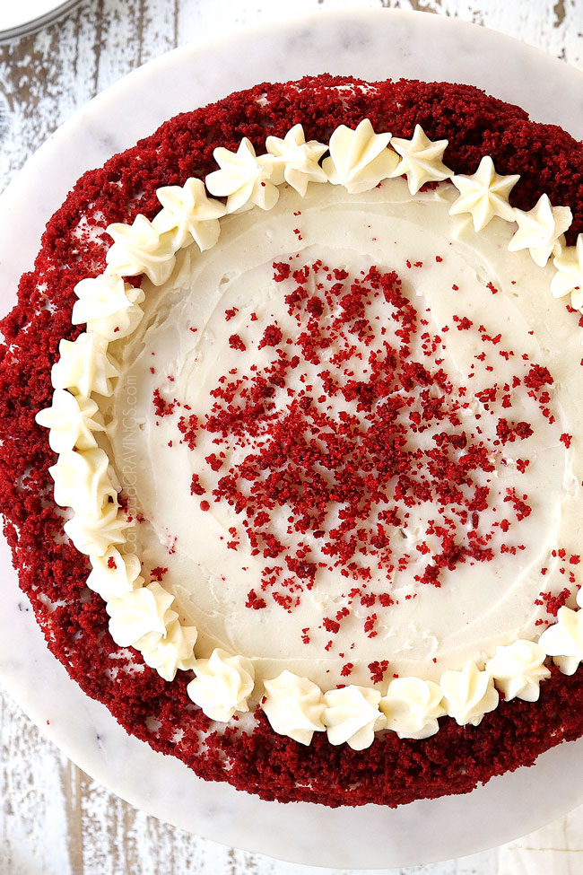 top view of red velvet cheesecake recipe on a cake pedestal