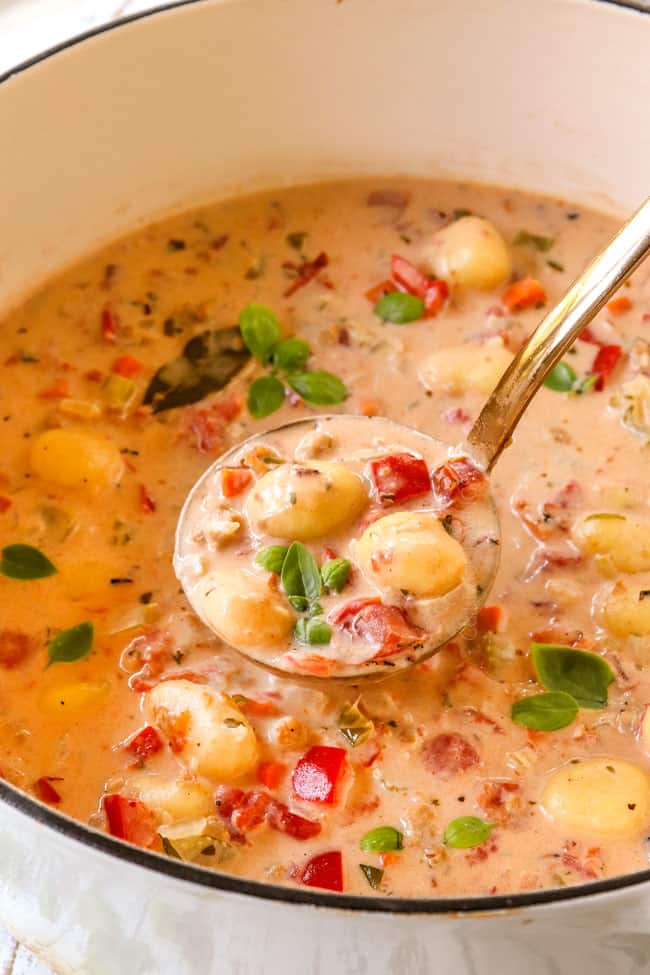 up close of a spoonful of gnocchi soup recipe showing how creamy it is
