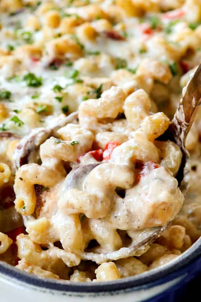 scooping up Cajun Chicken Pasta Alfredo with chicken and sausage