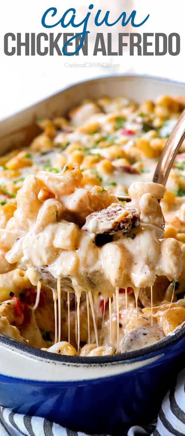 up close of a a spoonful of Cajun Chicken Alfredo showing how cheesy it is