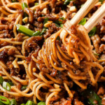 up close of Dan Dan Noodles showing how sleek they are