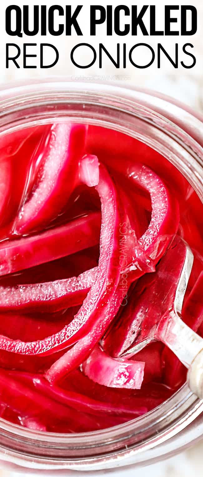 top view of pickled red onion recipe in a glass jar showing how thin the onions are