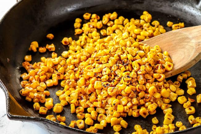 showing how to make taco bowl recipe by charring corn in skillet