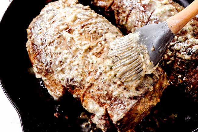 showing how to cook beef tenderloin recipe by slathering beef tenderloin roasts with herb butter before the beef goes in the oven