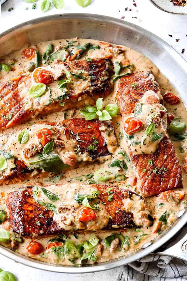 Tuscan salmon recipe with sun-dried tomato cream sauce with tomatoes