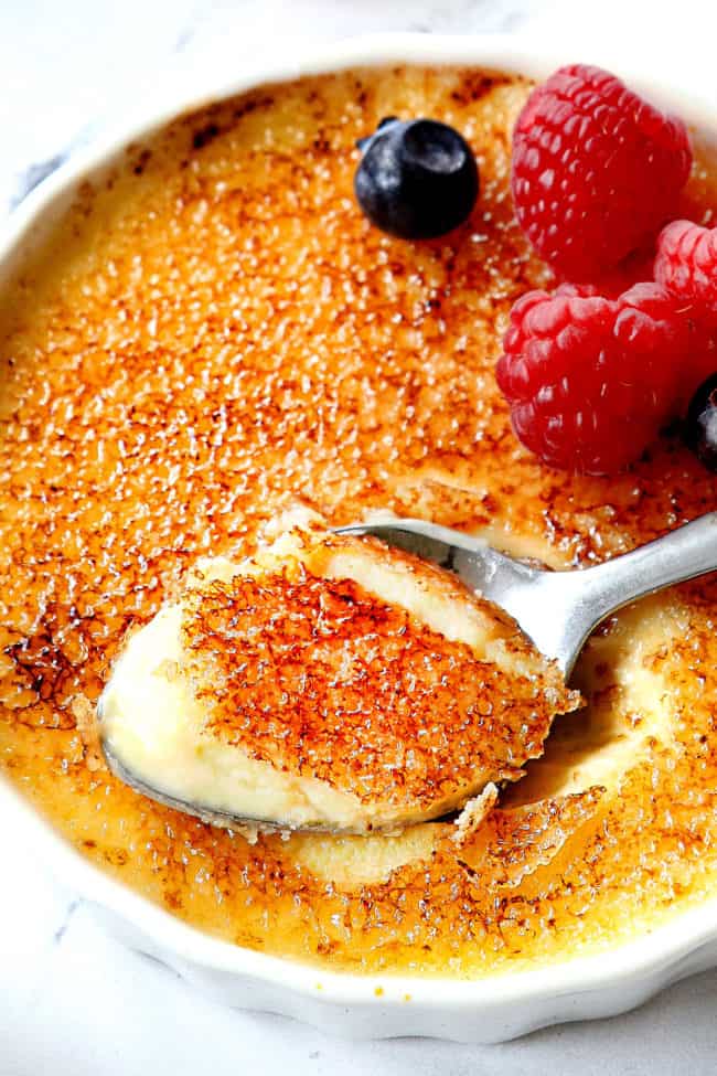 up close of a spoon sitting in crรจme brรปlรฉe recipe
