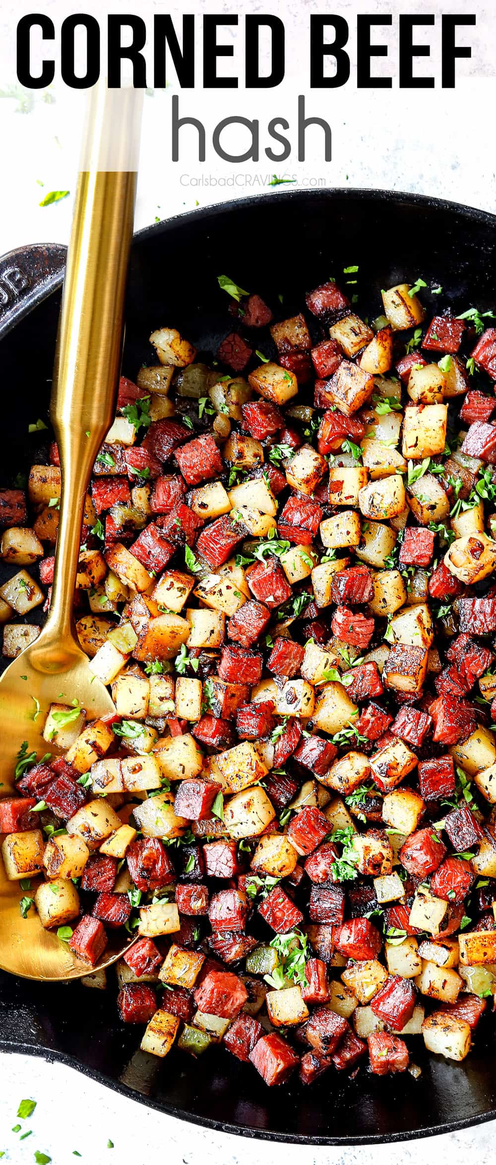 top view of corned beef hash in a skillet with corned beef, potatoes and onions