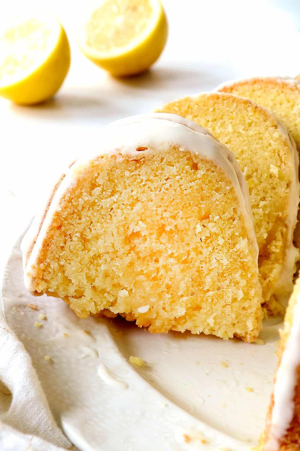 up close of a slice of lemon pound cake recipe showing how moist it is