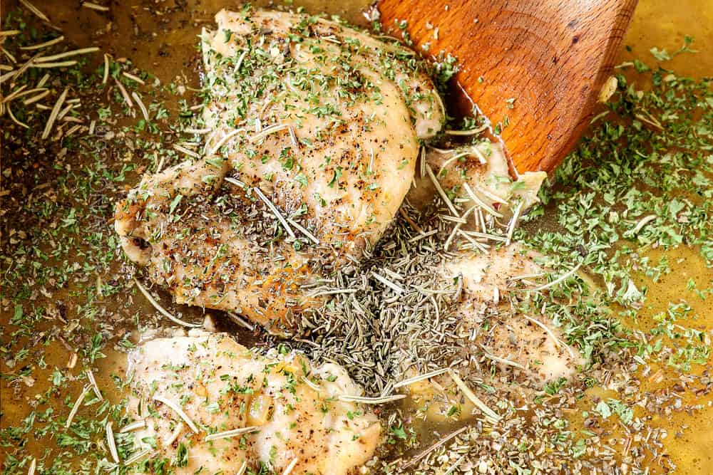 showing how to make lemon chicken orzo soup by adding chicken, chicken broth and seasonings to the pot