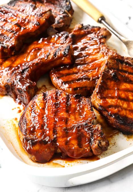 up close of grilled pork chops recipe showing how juicy they are
