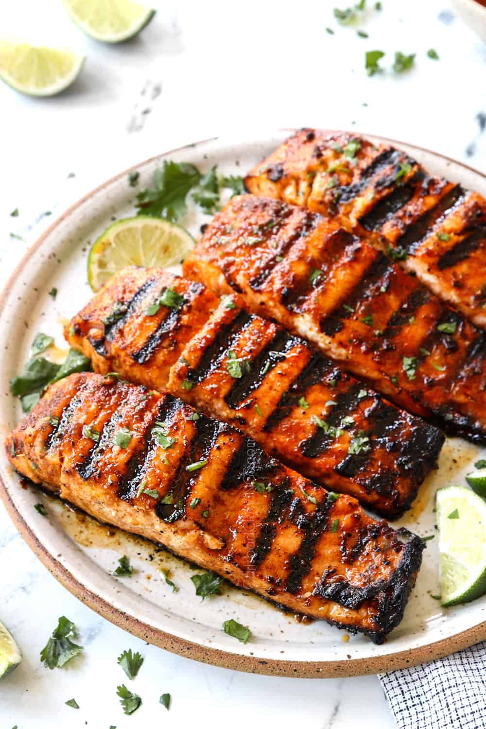 grilled salmon recipe on a plate showing how juicy it is