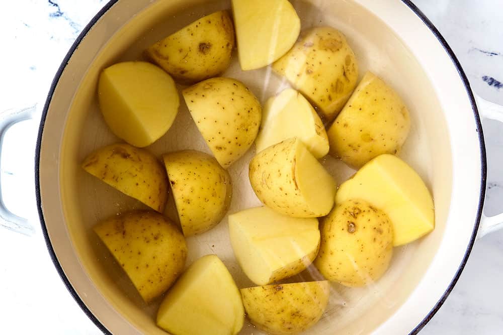 showing how to make potato salad by boiling Yukon potatoes with the skin on