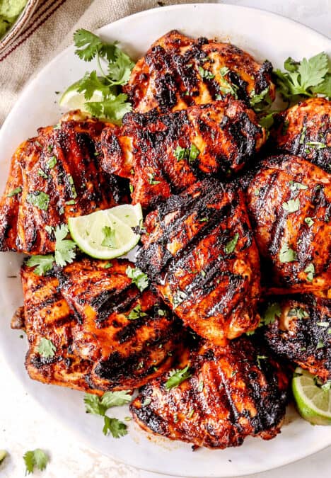top view of pollo asado on a white plate