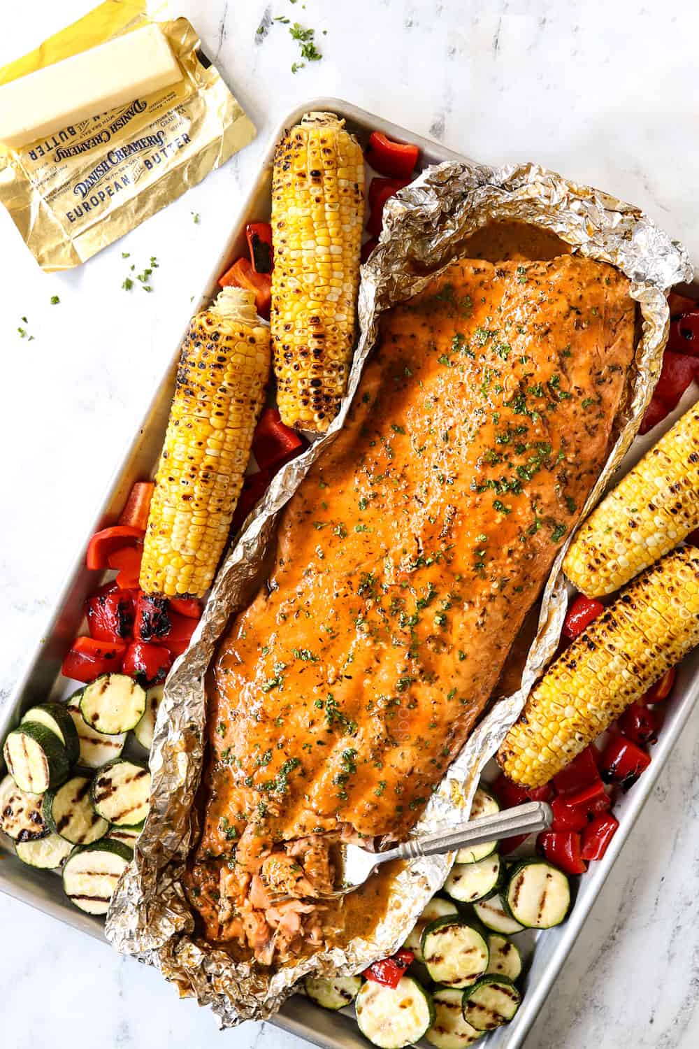 showing how to make grilled salmon in foil by letting the salmon rest after grilling