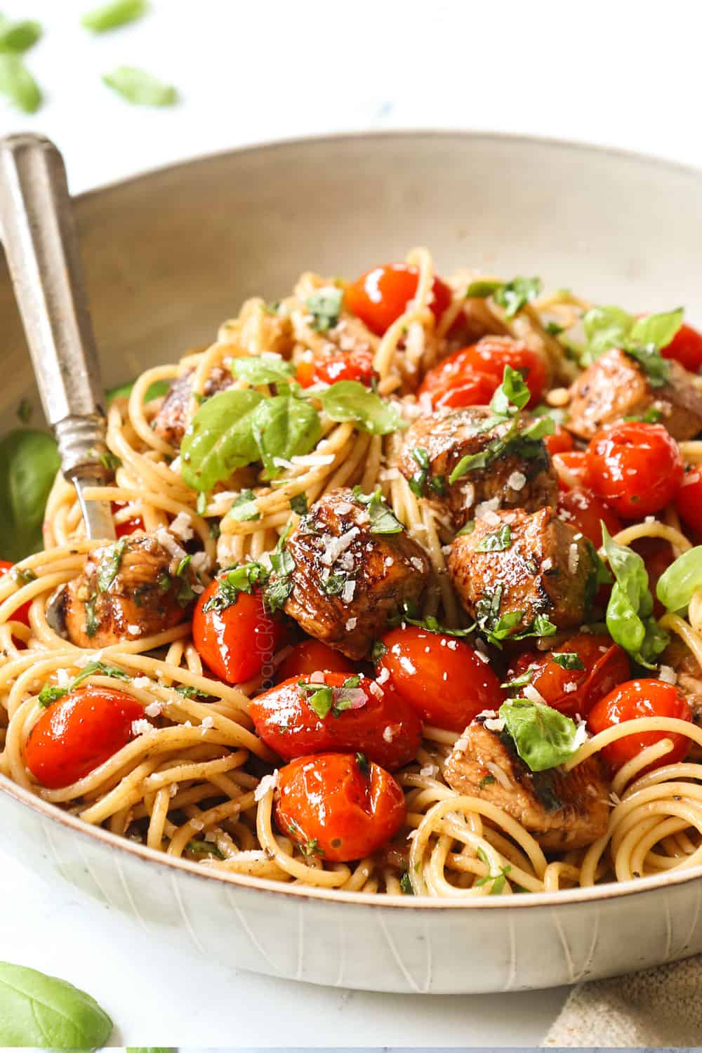 up close of bruschetta chicken pasta in a bowl