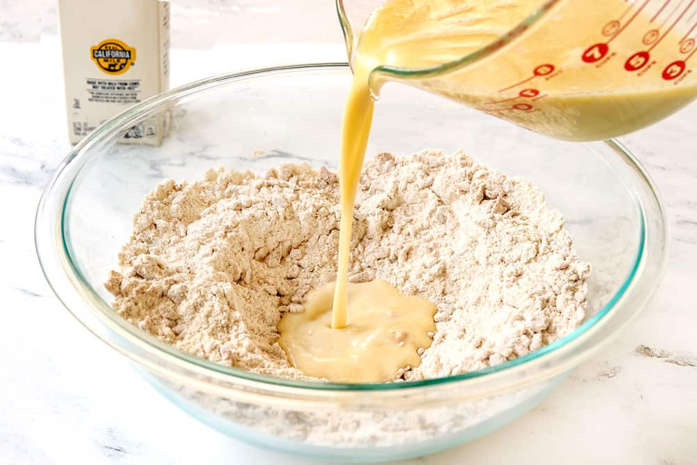 showing how to make cereal pancakes by pouring wet ingredients into dry ingredients