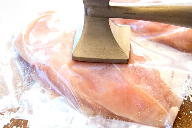 showing how to make chicken Caprese recipe by pounding chicken to an even thickness with a meat mallet