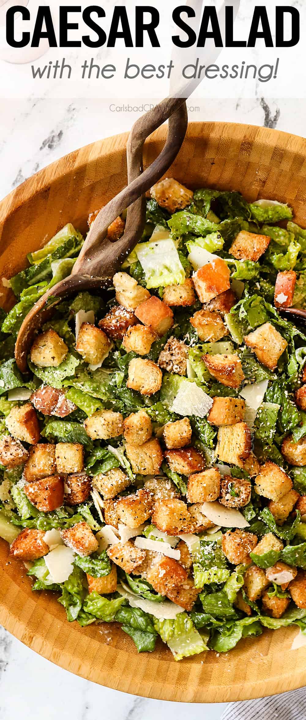 top view of Caesar Salad in a wooden bowl