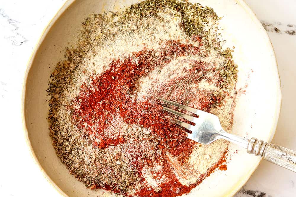 showing how to make Cajun shrimp by mixing Cajun seasonings together