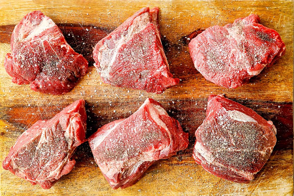 showing how to make birria de res by seasoning beef with salt and pepper