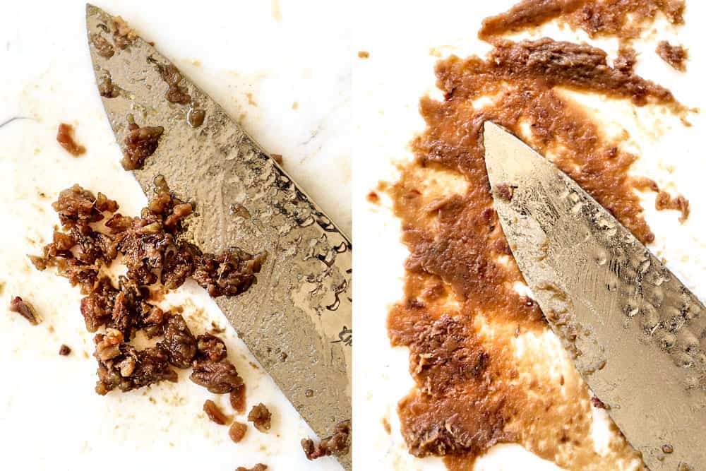 showing how to make Caesar dressing by mincing the anchovies and then mashing with the side of a knife