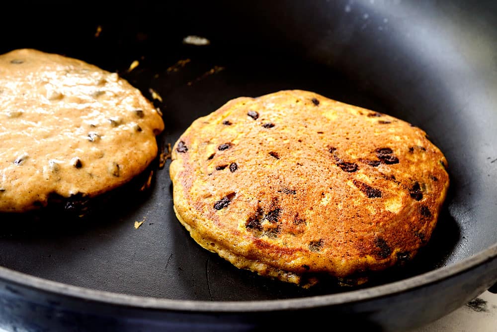 showing how to make pumpkin pancake recipe by adding batter to a nonstick skillet and cooking pancakes