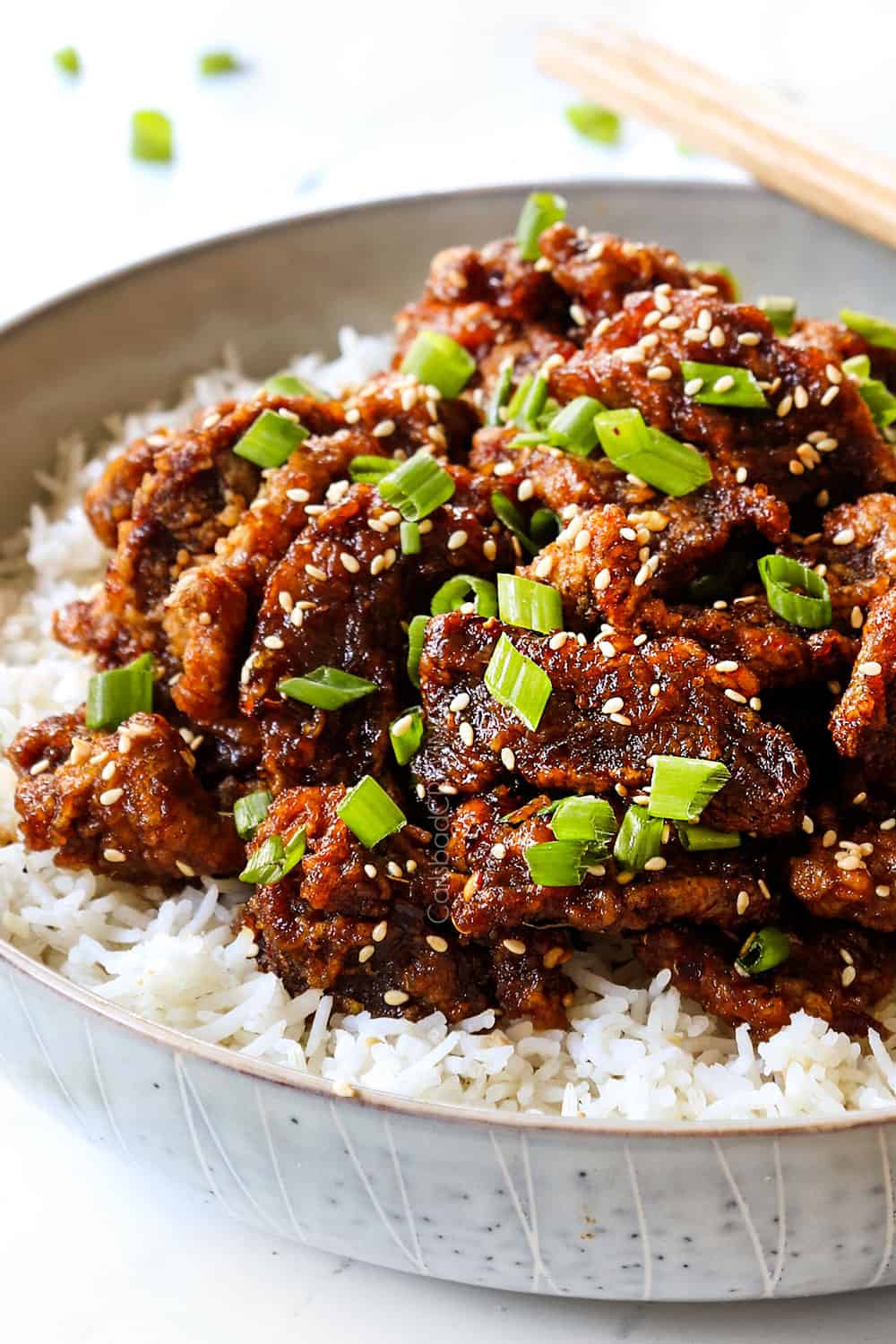 up close side view of ginger beef recipe showing how crispy it is