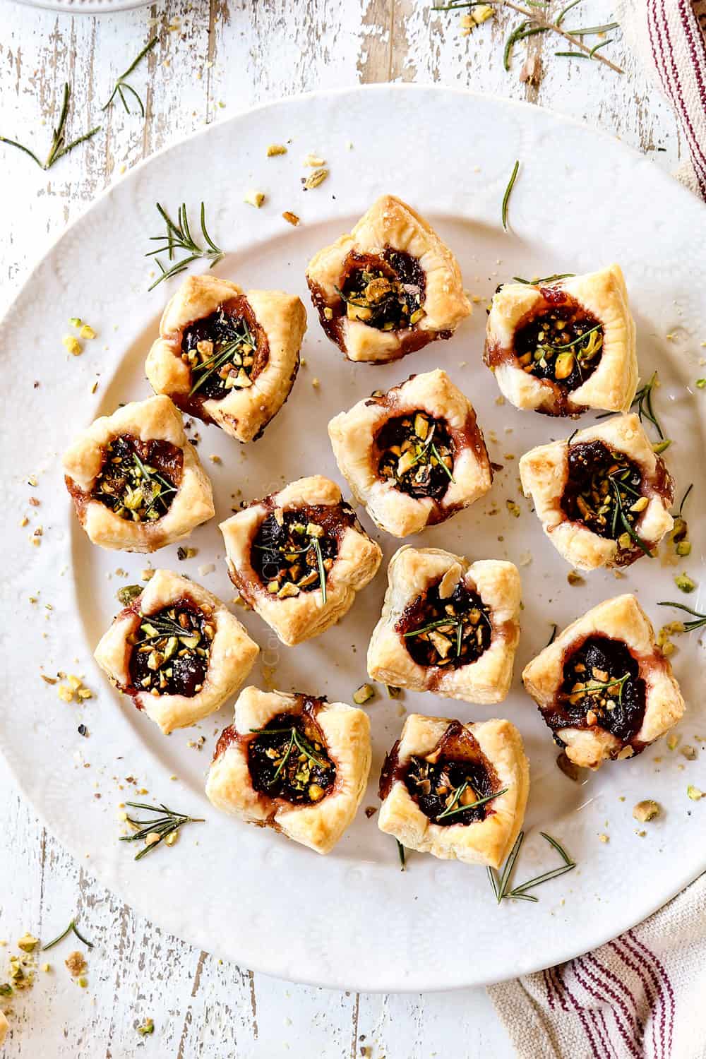 top view of serving cranberry brie bites on a white platter
